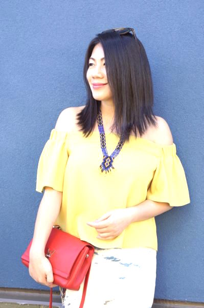 Grace's outfit - yellow top, red bag