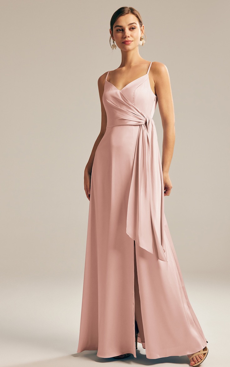 Woman wearing pink floor length gown
