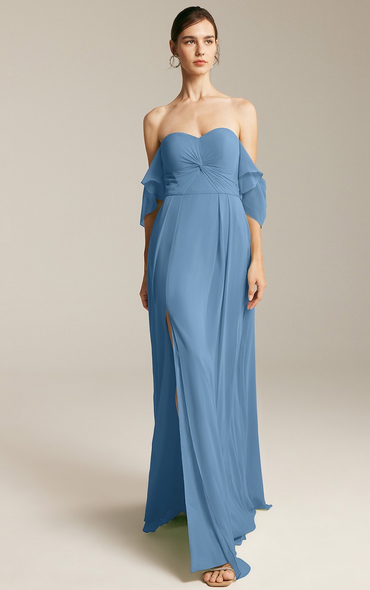 Woman wearing blue sweetheart neckline gown