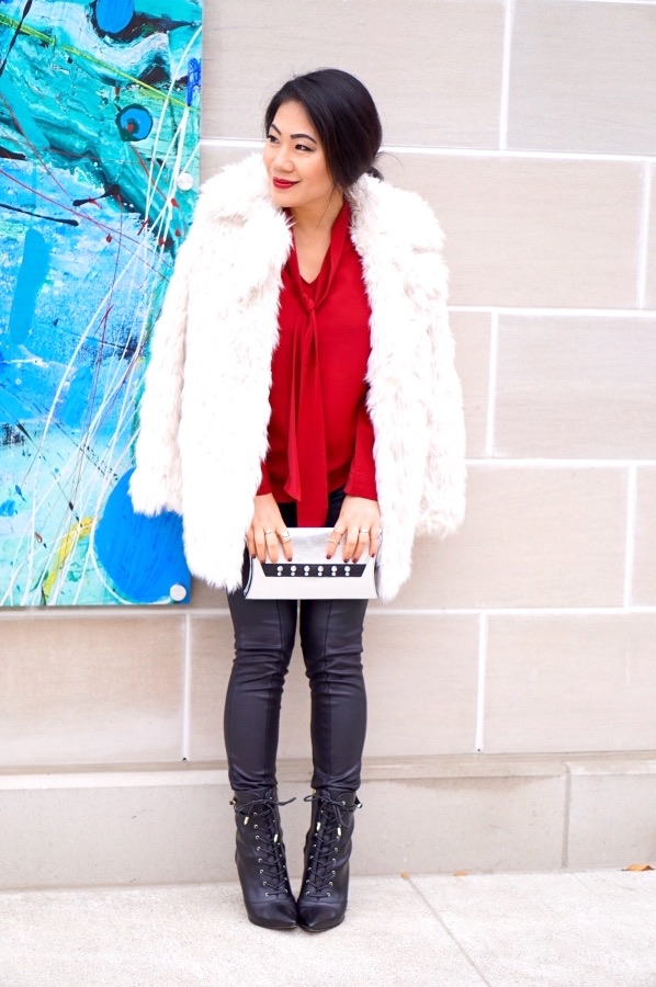grace-in-a-red-tunic-with-a-white-fur-jackets-and-leather-pants-with-laceup-booties