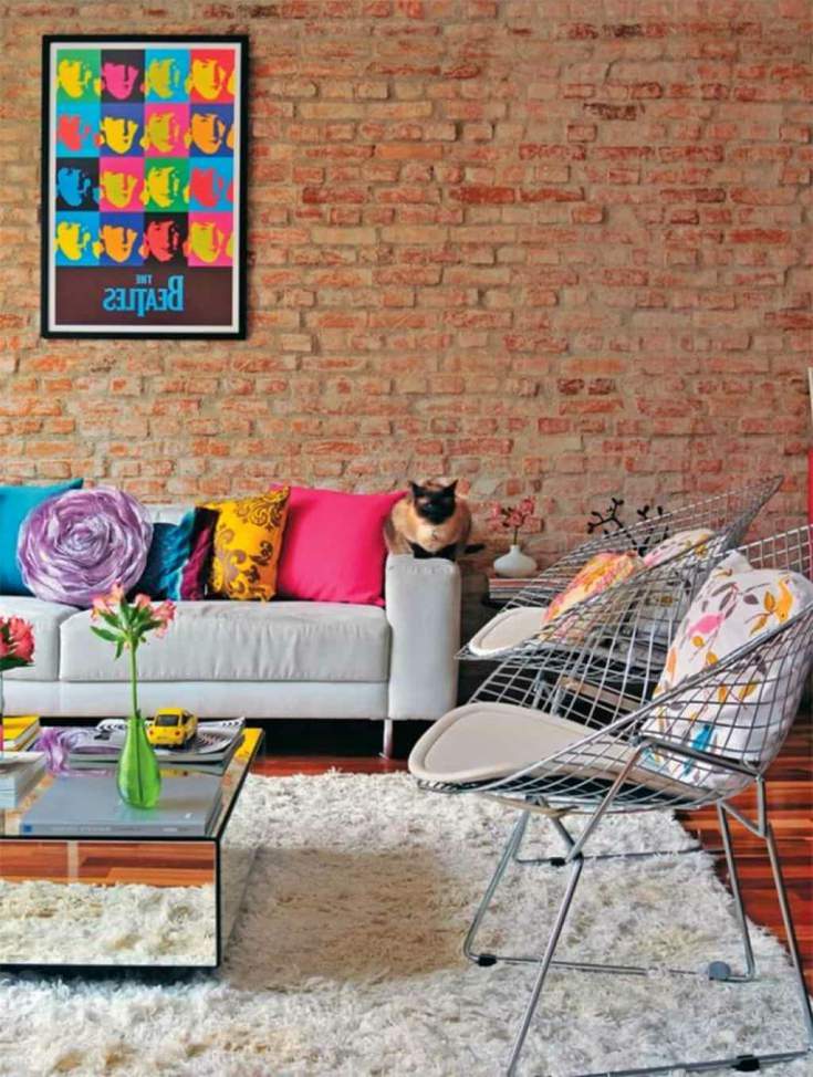 Brick wall with pop art decor in living-room